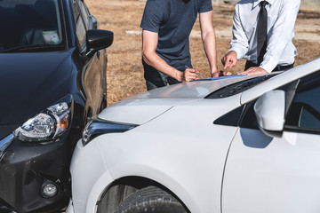 car accident with people standing